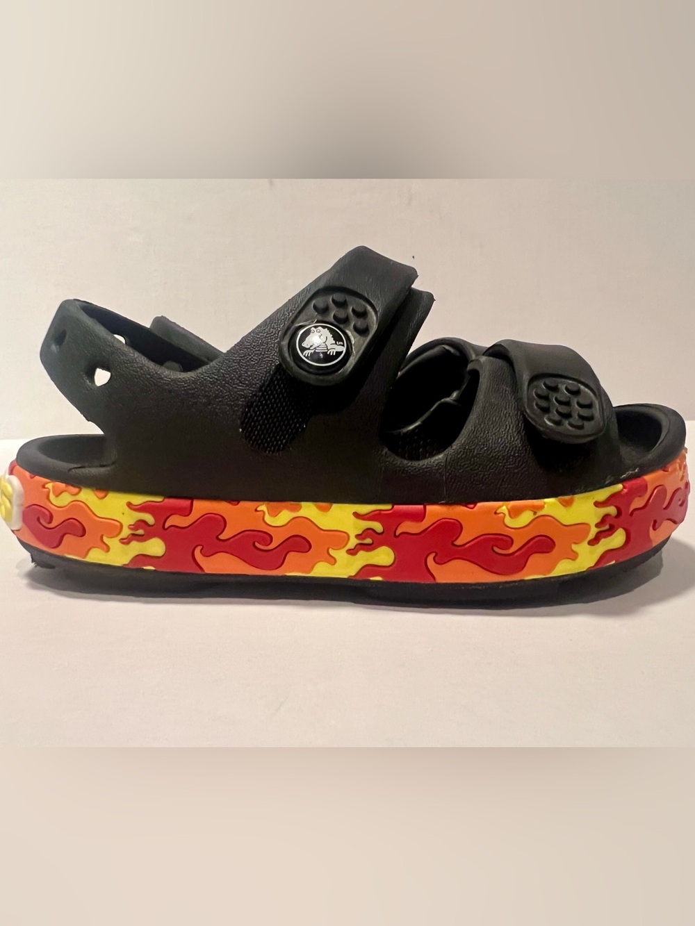 Crocs Kids Black Clog Sandals with Red-Orange Flame Accent